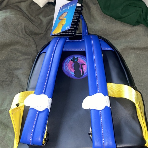 This loungefly Coraline mini cosplay backpack - Picture 2 of 4